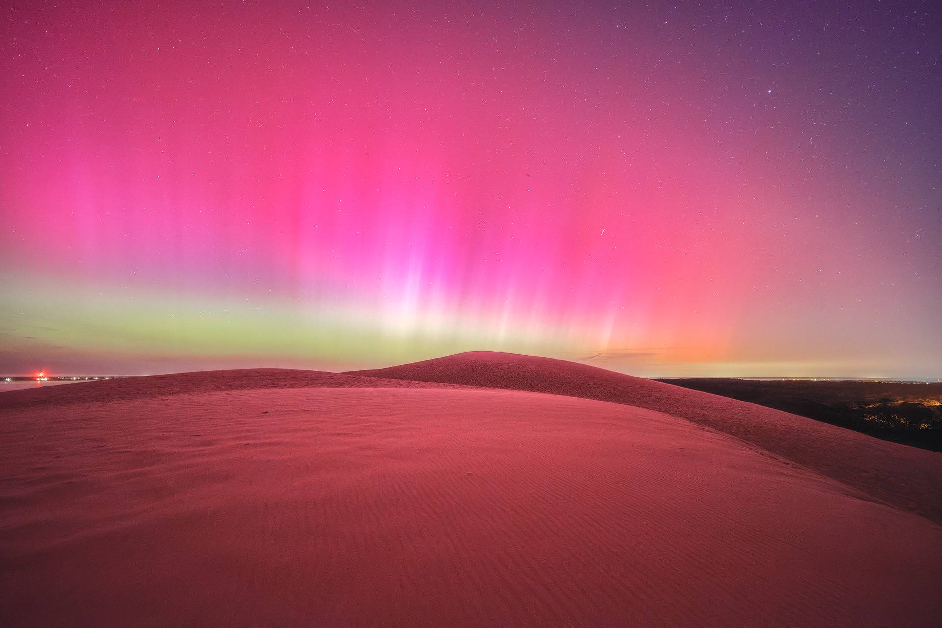 Photo d'une aurore boréale sur la Dune du Pilat