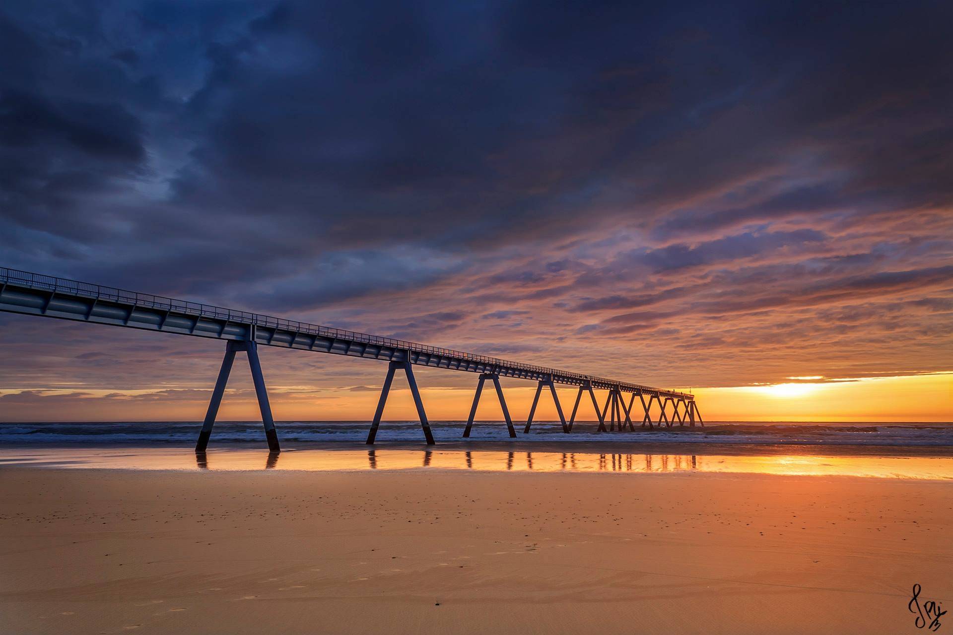 Coucher de soleil au Wharf vu depuis la plage