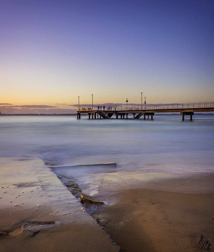 Jetée du Moulleau au coucher du soleil vue depuis la plage